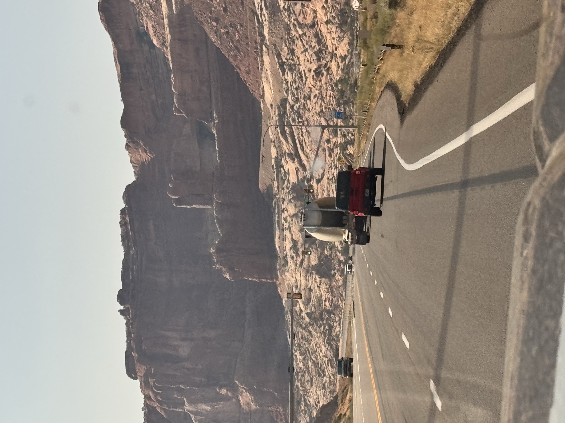 Road approaching the red-rock formations near Moab