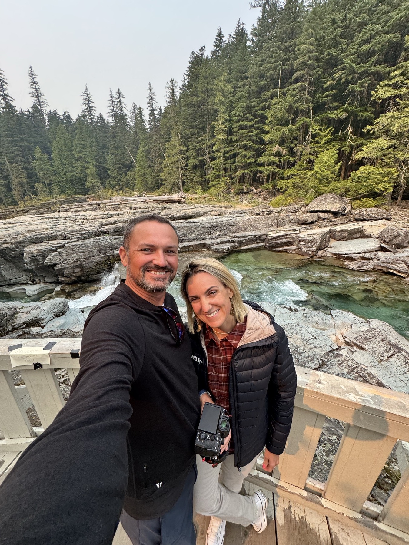 Mike and Emilie together beside the river near West Glacier