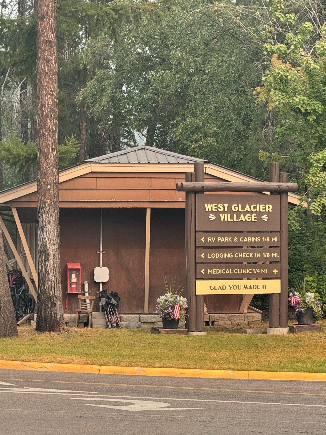 West Glacier Village sign on the road out of the park