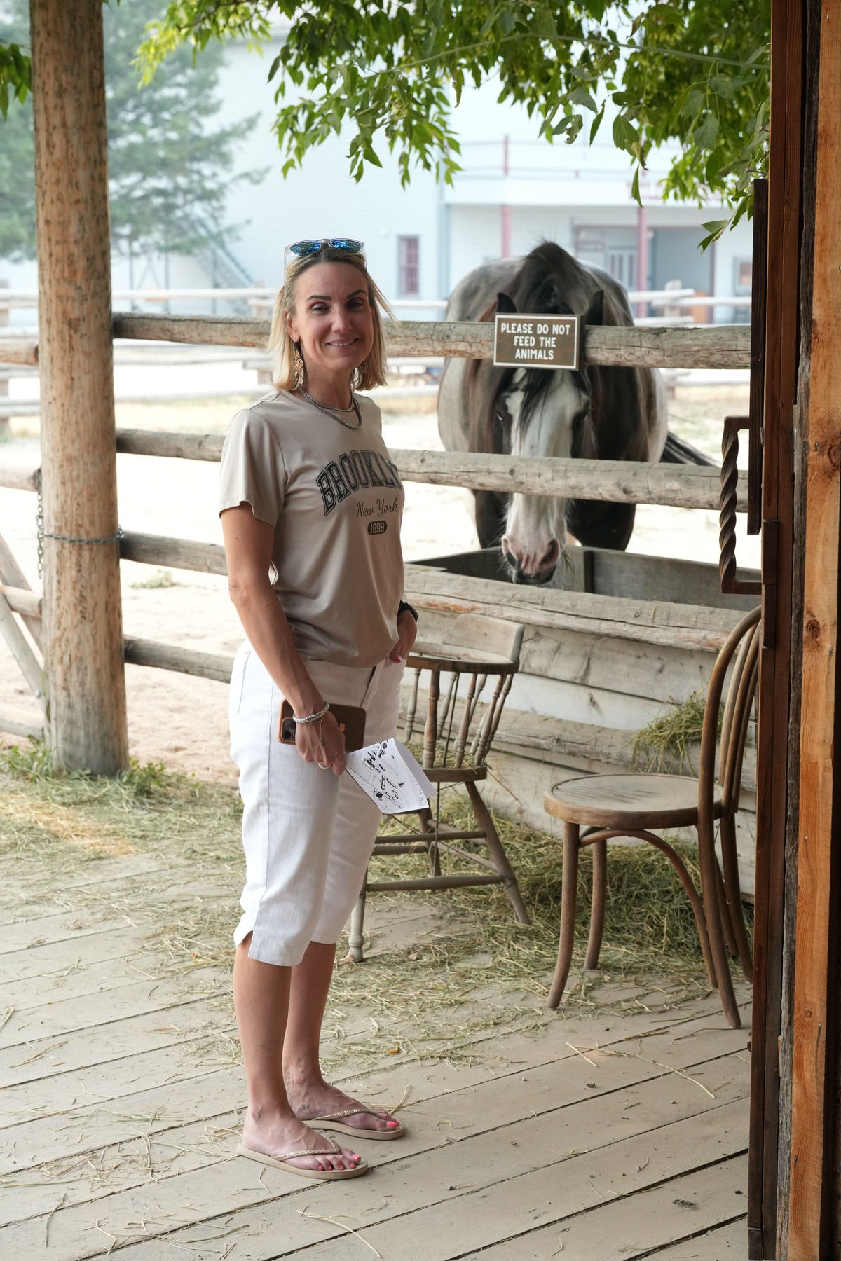 Emilie on a wooden walkway at Fort Steele
